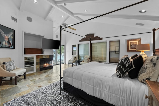 18 S Shore Dr S, Galveston, TX 77551 - bedroom featuring beamed ceiling, recessed lighting, stone tile flooring, and visible vents