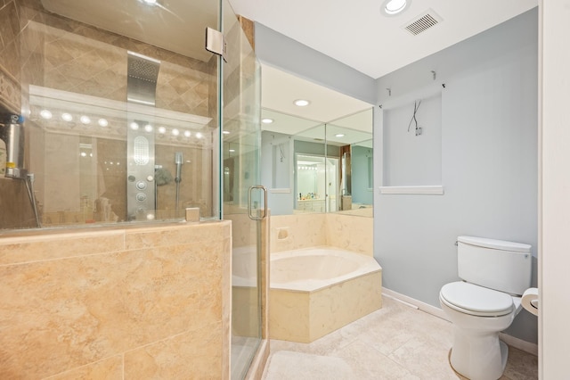 bathroom featuring a bath, visible vents, a shower stall, baseboards, and toilet