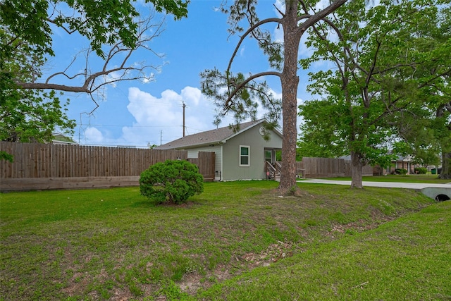 view of yard with fence