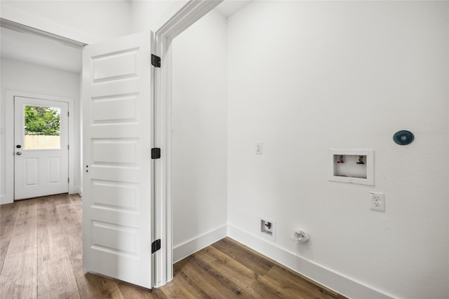 laundry area with hookup for an electric dryer, laundry area, wood finished floors, baseboards, and hookup for a washing machine