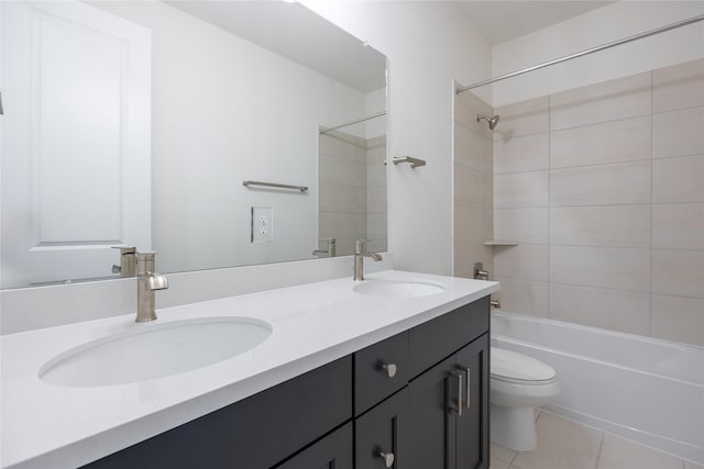 12810 Belford Gardens Dr, Humble, TX 77346 - bathroom with toilet, double vanity, shower / bath combination, and tile patterned floors