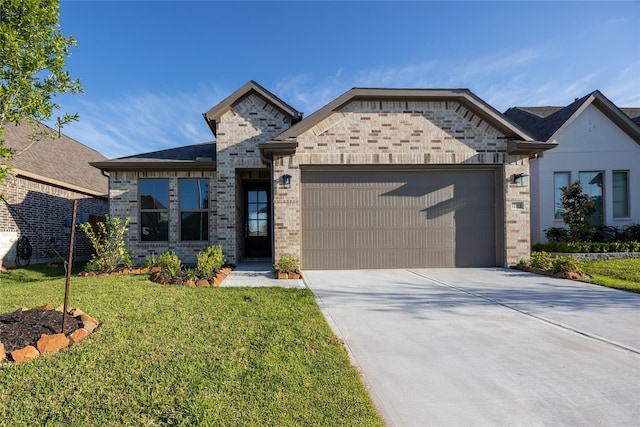 12810 Belford Gardens Dr, Humble, TX 77346 - french country style house with an attached garage, brick siding, a front lawn, and concrete driveway