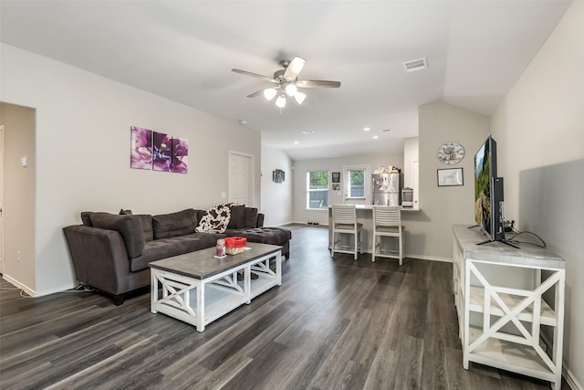 living area with dark wood-style flooring, a ceiling fan, baseboards, recessed lighting, and visible vents