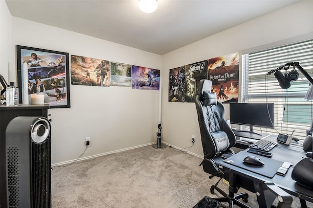 home office featuring baseboards and carpet
