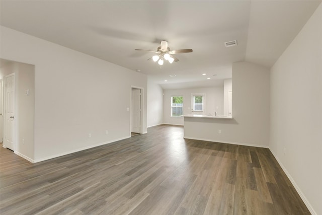 254 Cumberland Forest Dr, Magnolia, TX 77354 - unfurnished living room featuring ceiling fan, dark wood-type flooring, baseboards, and recessed lighting