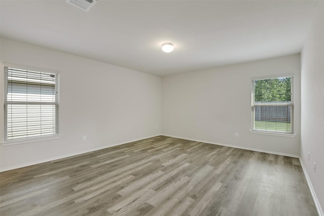 254 Cumberland Forest Dr, Magnolia, TX 77354 - spare room with wood finished floors and baseboards