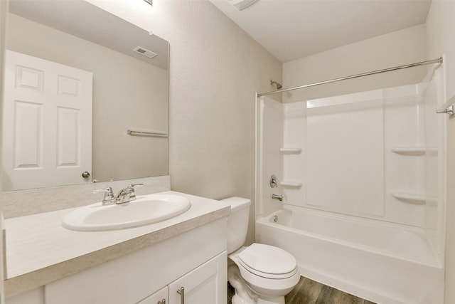 254 Cumberland Forest Dr, Magnolia, TX 77354 - full bath featuring toilet, wood finished floors, vanity, and shower / bathtub combination