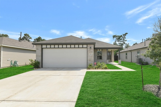 254 Cumberland Forest Dr, Magnolia, TX 77354 - view of front of property featuring a front lawn, a garage, concrete driveway, and central AC unit