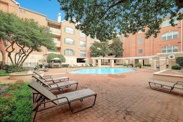 pool with a patio