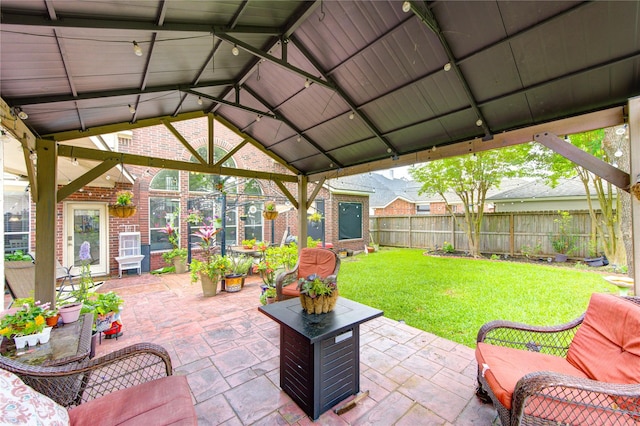 view of patio / terrace featuring a gazebo and a fenced backyard