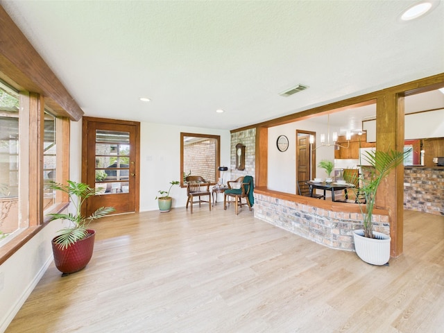 interior space with visible vents, recessed lighting, baseboards, and wood finished floors