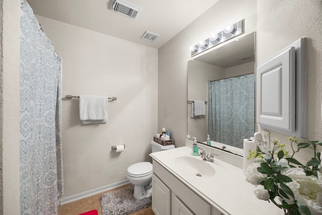 full bathroom featuring vanity, tile patterned floors, toilet, and visible vents
