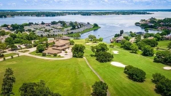 bird's eye view with a residential view, a water view, and golf course view