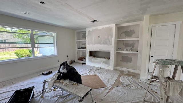 5514 Cheena Dr, Houston, TX 77096 - living area with built in features and baseboards