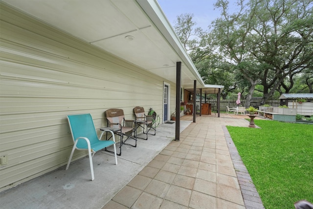 view of patio / terrace with fence