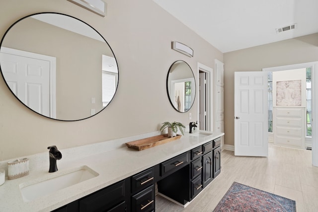 full bathroom with double vanity