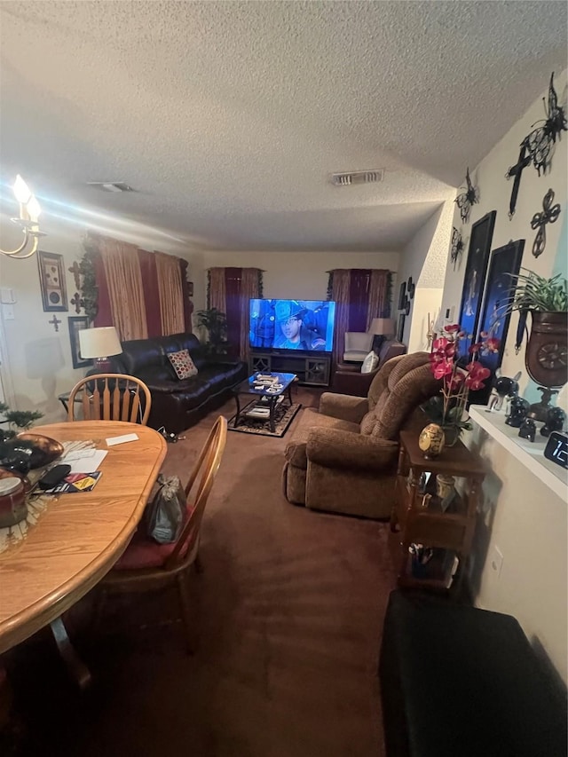 4710 Salina St, Houston, TX 77026 - carpeted living area with a textured ceiling