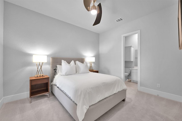 27954 Presley Park Dr, Spring, TX 77386 - bedroom with visible vents, connected bathroom, baseboards, and light carpet