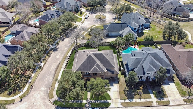 birds eye view of property with a residential view