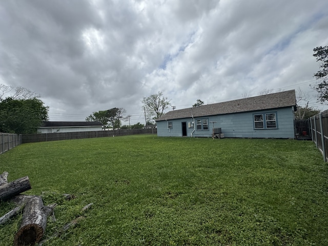 view of yard featuring a fenced backyard