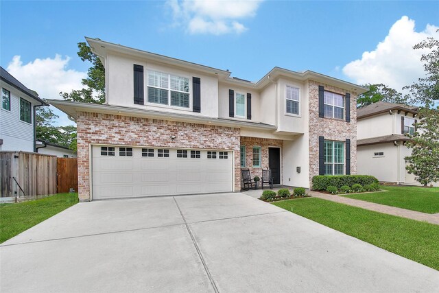 8322 Merlin Dr, Spring Valley Village, TX 77055 - view of front of home with concrete driveway, an attached garage, stucco siding, and brick siding