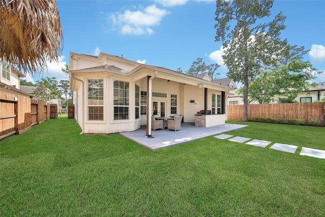 8322 Merlin Dr, Spring Valley Village, TX 77055 - rear view of property with stucco siding, french doors, and a patio area