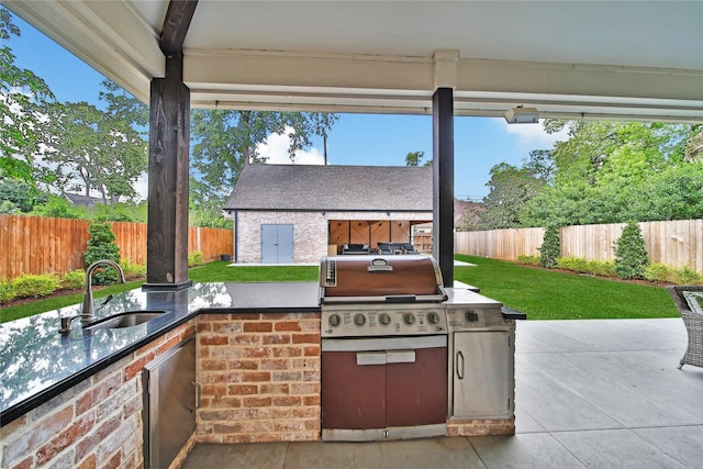 8322 Merlin Dr, Spring Valley Village, TX 77055 - view of patio / terrace featuring area for grilling, a sink, and a grill
