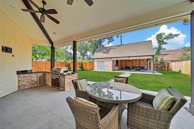 8322 Merlin Dr, Spring Valley Village, TX 77055 - view of patio / terrace with an outdoor kitchen, grilling area, a sink, ceiling fan, and outdoor dining area