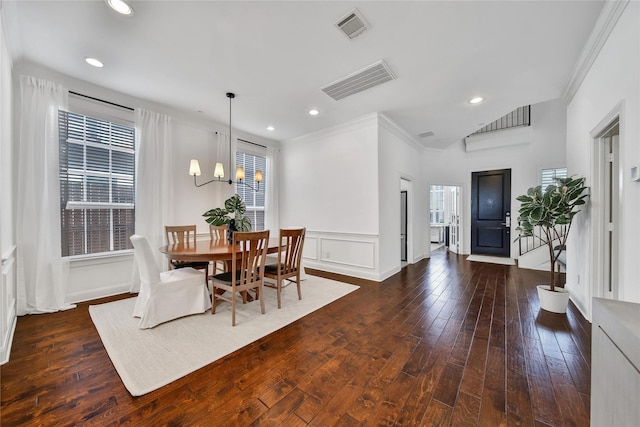 8322 Merlin Dr, Spring Valley Village, TX 77055 - dining area featuring ornamental molding, hardwood / wood-style floors, a chandelier, recessed lighting, and baseboards