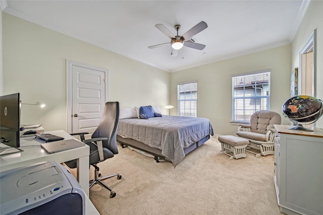 8322 Merlin Dr, Spring Valley Village, TX 77055 - bedroom with light colored carpet, a desk, ornamental molding, and a ceiling fan