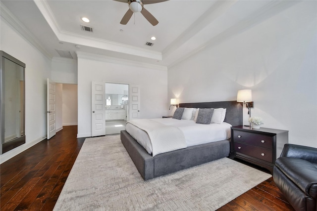 8322 Merlin Dr, Spring Valley Village, TX 77055 - bedroom with dark wood-style floors, a raised ceiling, crown molding, recessed lighting, and ensuite bath