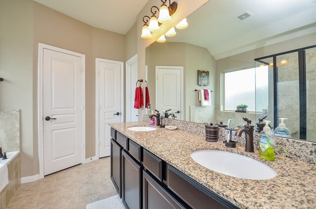 bathroom featuring visible vents, a sink, double vanity, and a shower stall