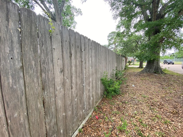 view of property exterior with fence