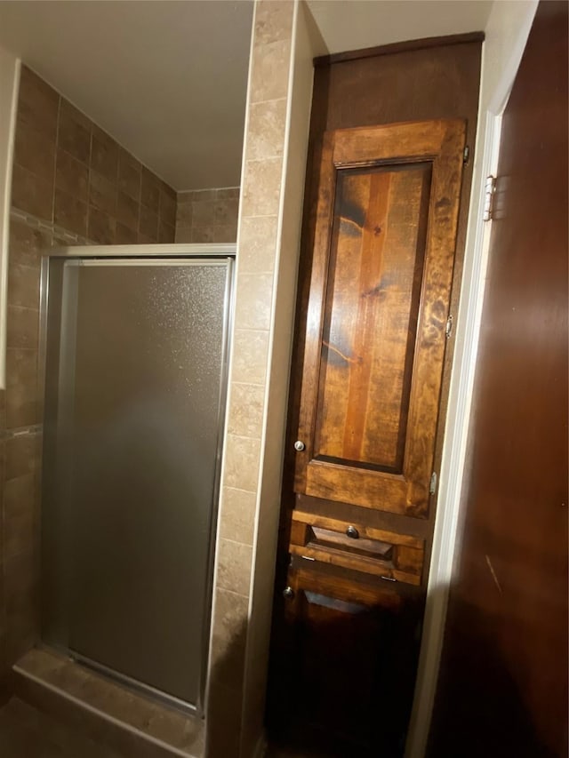 bathroom featuring a stall shower
