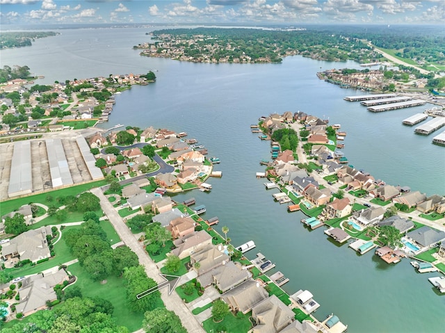 aerial view with a water view and a residential view