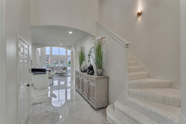 2025 S Shore Blvd, Montgomery, TX 77356 - interior space featuring arched walkways, marble finish floor, and a towering ceiling