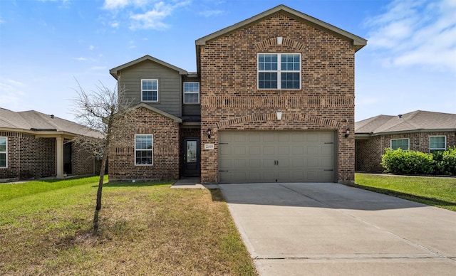 traditional-style home featuring brick siding, a garage, a front yard, and concrete driveway