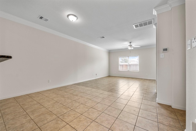 unfurnished room with crown molding, a ceiling fan, light tile patterned flooring, and visible vents