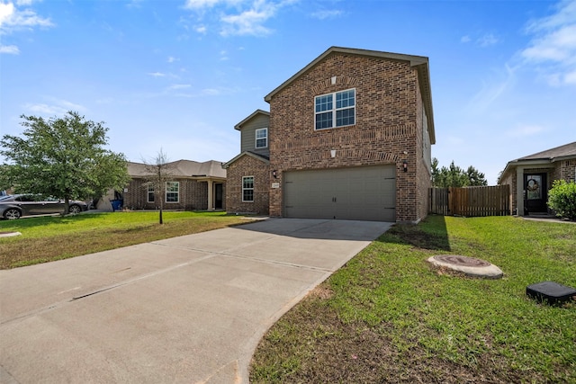 traditional-style house with a garage, fence, a front yard, brick siding, and driveway
