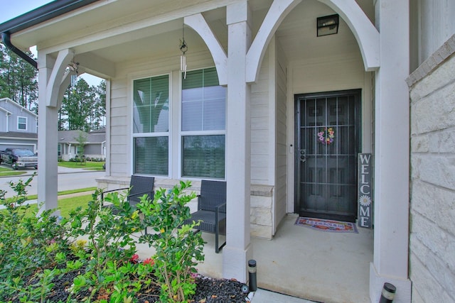 property entrance with a porch