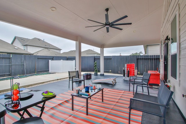view of patio / terrace with a fenced backyard and a ceiling fan