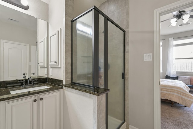 full bath with a ceiling fan, ensuite bath, visible vents, and a stall shower