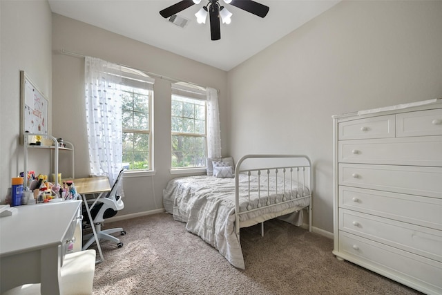 carpeted bedroom featuring visible vents, baseboards, ceiling fan, and lofted ceiling