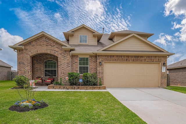 traditional-style home with an attached garage, driveway, a front lawn, and brick siding
