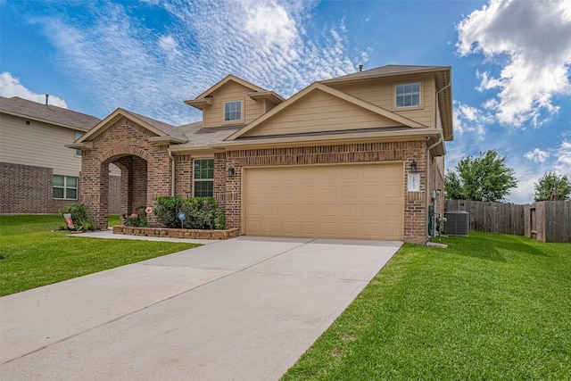 view of front of house featuring fence, brick siding, a front yard, central AC unit, and concrete driveway