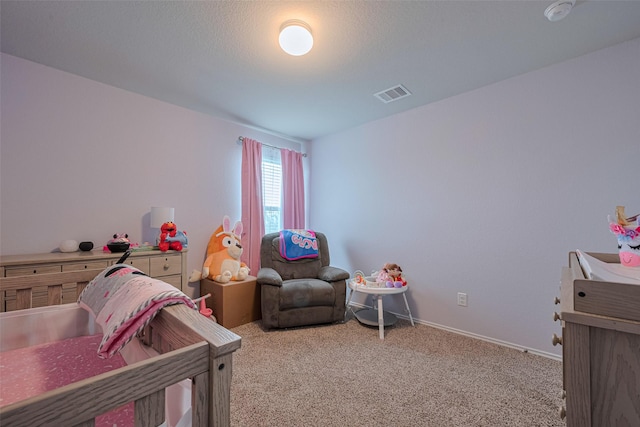 bedroom featuring light carpet and visible vents