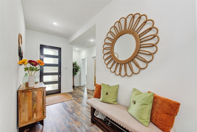 entrance foyer featuring recessed lighting, baseboards, and dark wood-style floors