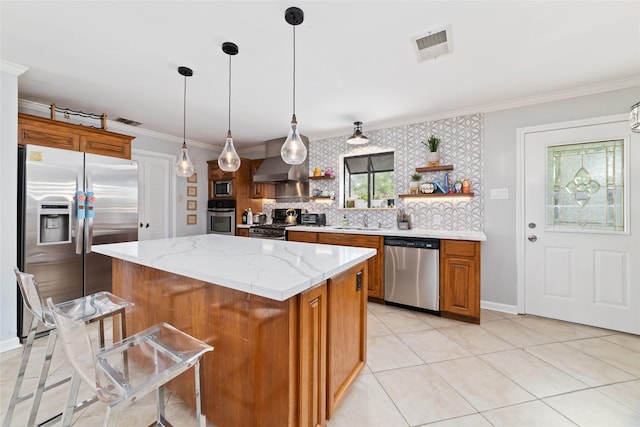 kitchen with brown cabinets, open shelves, appliances with stainless steel finishes, a sink, and tasteful backsplash
