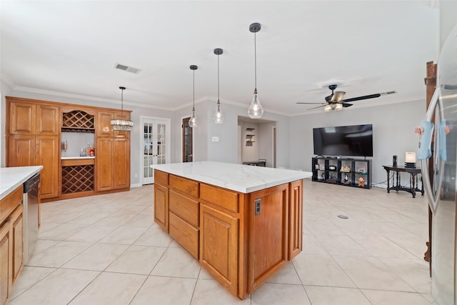 kitchen featuring stainless steel dishwasher, a ceiling fan, visible vents, and light tile patterned floors