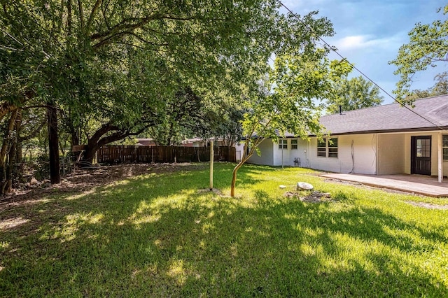 view of yard with fence